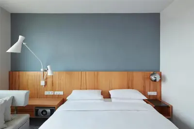 Un ou plusieurs lits dans un hébergement de l'établissement Hyatt Regency Paris Etoile