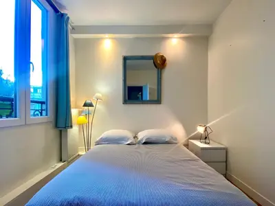 Un ou plusieurs lits dans un hébergement de l'établissement Le duplex de la reine - lesparisnormands