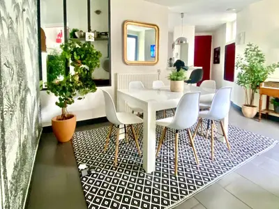 Coin salon dans l'établissement Le duplex de la reine - lesparisnormands