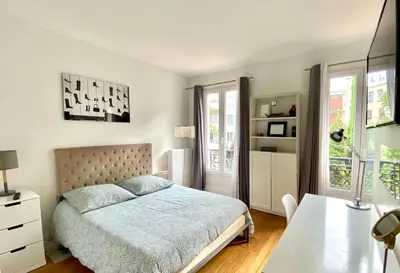Un ou plusieurs lits dans un hébergement de l'établissement Le duplex de la reine - lesparisnormands