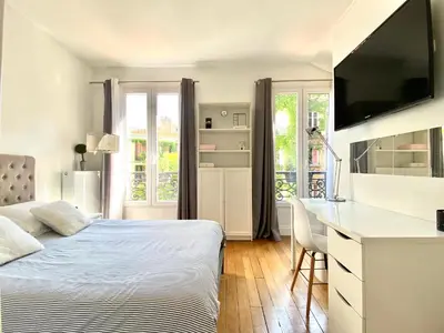 Un ou plusieurs lits dans un hébergement de l'établissement Le duplex de la reine - lesparisnormands