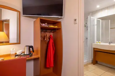 Salle de bains dans l'établissement Hôtel L'Interlude