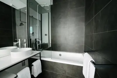Salle de bains dans l'établissement Atypik Hotel