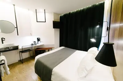 Un ou plusieurs lits dans un hébergement de l'établissement Atypik Hotel