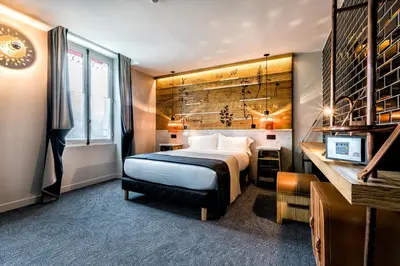 Un ou plusieurs lits dans un hébergement de l'établissement Hotel Restaurant Au Boeuf Couronné