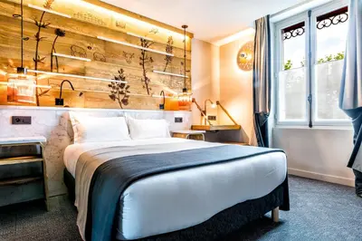 Un ou plusieurs lits dans un hébergement de l'établissement Hotel Restaurant Au Boeuf Couronné