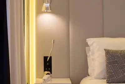Un ou plusieurs lits dans un hébergement de l'établissement Nouvel Hôtel Eiffel