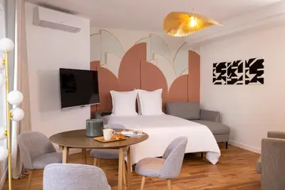 Un ou plusieurs lits dans un hébergement de l'établissement Yuna Blanche - Serviced Apartments