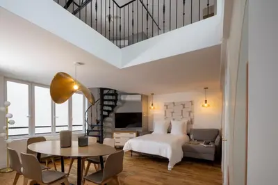 Un ou plusieurs lits dans un hébergement de l'établissement Yuna Blanche - Serviced Apartments