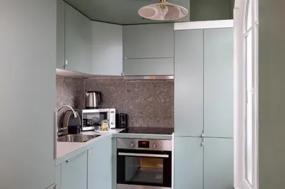Cuisine ou kitchenette dans l'établissement Yuna Blanche - Serviced Apartments