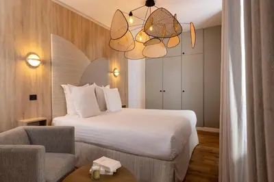 Un ou plusieurs lits dans un hébergement de l'établissement Yuna Blanche - Serviced Apartments