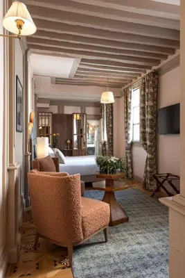 Un ou plusieurs lits dans un hébergement de l'établissement Hôtel Fougère