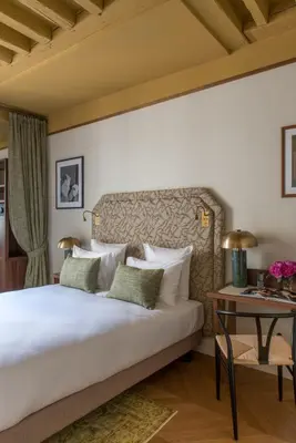 Un ou plusieurs lits dans un hébergement de l'établissement Hôtel Fougère