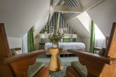 Un ou plusieurs lits dans un hébergement de l'établissement Hôtel Fougère