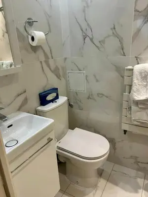 Salle de bains dans l'établissement Hôtel Derby Eiffel