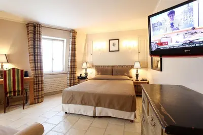 Un ou plusieurs lits dans un hébergement de l'établissement Hotel Albe Bastille