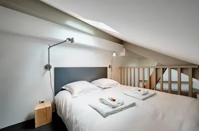 Un ou plusieurs lits dans un hébergement de l'établissement My Maison In Paris - Sentier