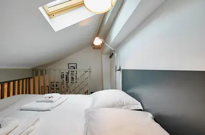 Un ou plusieurs lits dans un hébergement de l'établissement My Maison In Paris - Sentier