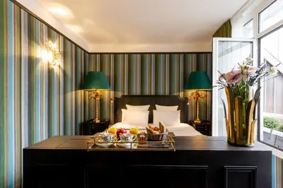 Un ou plusieurs lits dans un hébergement de l'établissement New Hotel République