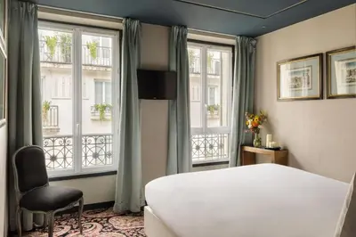 Un ou plusieurs lits dans un hébergement de l'établissement New Hotel République