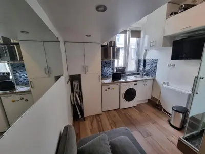 Cuisine ou kitchenette dans l'établissement Amazing Studio near Parc des Expositions