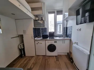 Cuisine ou kitchenette dans l'établissement Amazing Studio near Parc des Expositions
