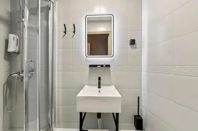 Salle de bains dans l'établissement Hotel Margot