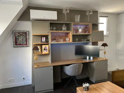 Télévision ou salle de divertissement dans l'établissement Parenthèse idéale Montorgueil loft In Paris