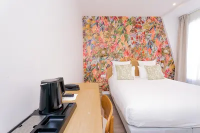 Un ou plusieurs lits dans un hébergement de l'établissement Bobo's hotel