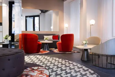 Coin salon dans l'établissement Hôtel Pastel Paris