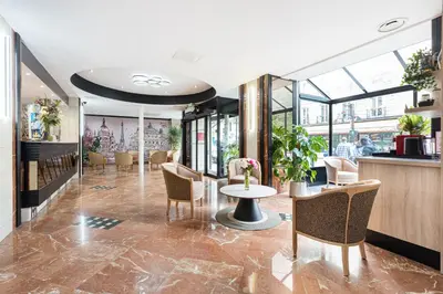 Coin salon dans l'établissement Hôtel Opera Lafayette