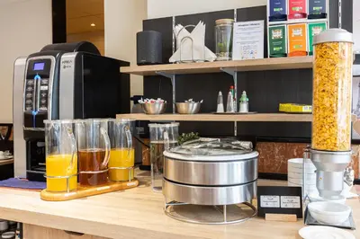 Cuisine ou kitchenette dans l'établissement Hôtel Opera Lafayette
