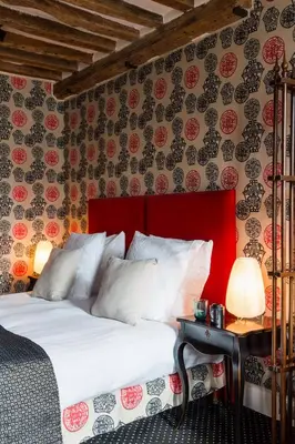 Un ou plusieurs lits dans un hébergement de l'établissement Hôtel Le Relais Saint-Germain
