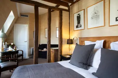 Un ou plusieurs lits dans un hébergement de l'établissement Hôtel Le Relais Saint-Germain