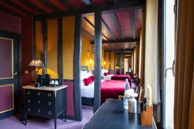 Un ou plusieurs lits dans un hébergement de l'établissement Hôtel Le Relais Saint-Germain