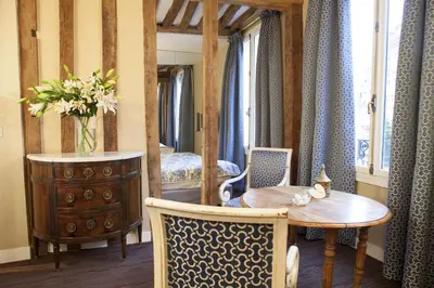 Coin salon dans l'établissement Hôtel Le Relais Saint-Germain