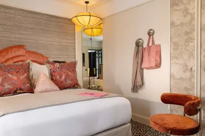 Un ou plusieurs lits dans un hébergement de l'établissement Hôtel l'Inattendu