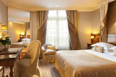Un ou plusieurs lits dans un hébergement de l'établissement Au Manoir Saint Germain