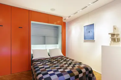 Un ou plusieurs lits dans un hébergement de l'établissement Terrace Matignon Apartment