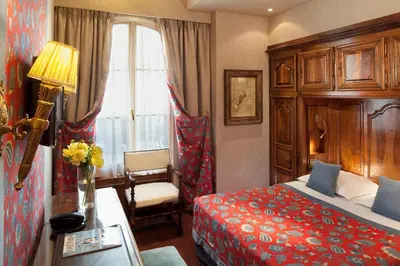 Un ou plusieurs lits dans un hébergement de l'établissement Hotel Left Bank Saint Germain
