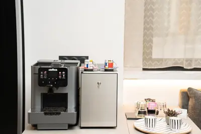 Cuisine ou kitchenette dans l'établissement Hôtel Du Mont Dore Batignolles