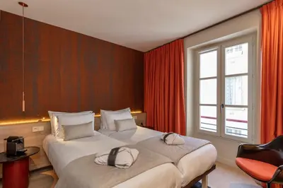 Un ou plusieurs lits dans un hébergement de l'établissement Hôtel de Lille - Saint-Germain des Près