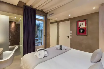 Un ou plusieurs lits dans un hébergement de l'établissement Hôtel de Lille - Saint-Germain des Près