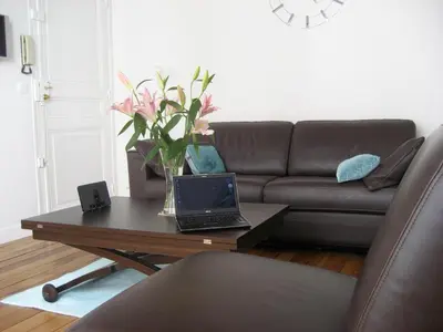 Coin salon dans l'établissement Opera Apartment