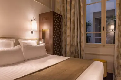 Un ou plusieurs lits dans un hébergement de l'établissement Crystal Hotel