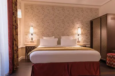 Un ou plusieurs lits dans un hébergement de l'établissement Crystal Hotel