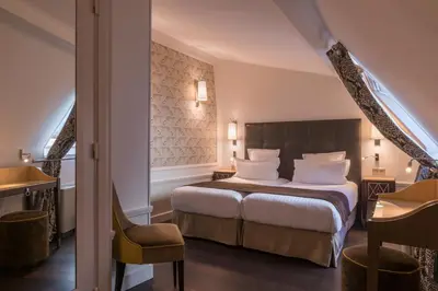 Un ou plusieurs lits dans un hébergement de l'établissement Crystal Hotel