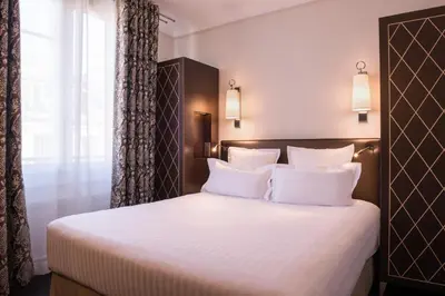 Un ou plusieurs lits dans un hébergement de l'établissement Crystal Hotel