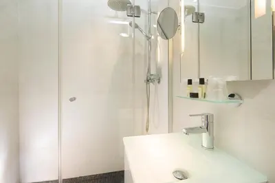 Salle de bains dans l'établissement Le Relais du Marais