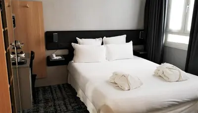 Un ou plusieurs lits dans un hébergement de l'établissement Libertel Gare Du Nord Suede